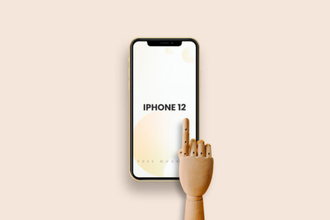 iPhone 12 with Wooden Hand Free Mockup